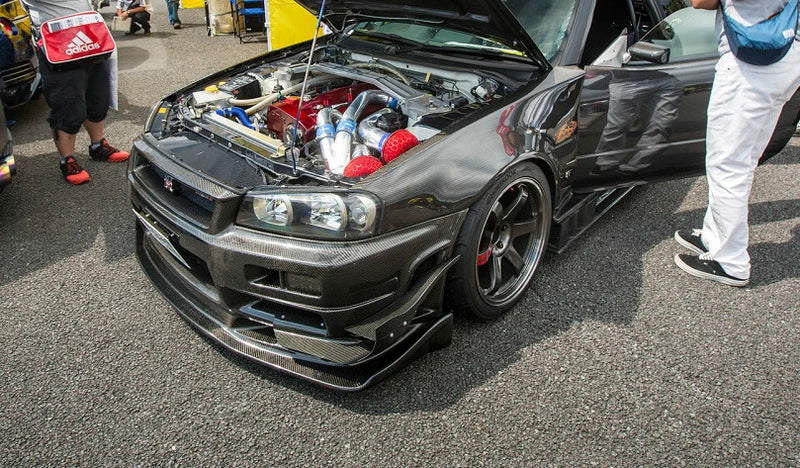 AS Style Carbon Fiber Front Lip – Nissan Skyline R34 GTR (1999–2002)