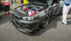 AS Style Carbon Fiber Front Lip – Nissan Skyline R34 GTR (1999–2002)
