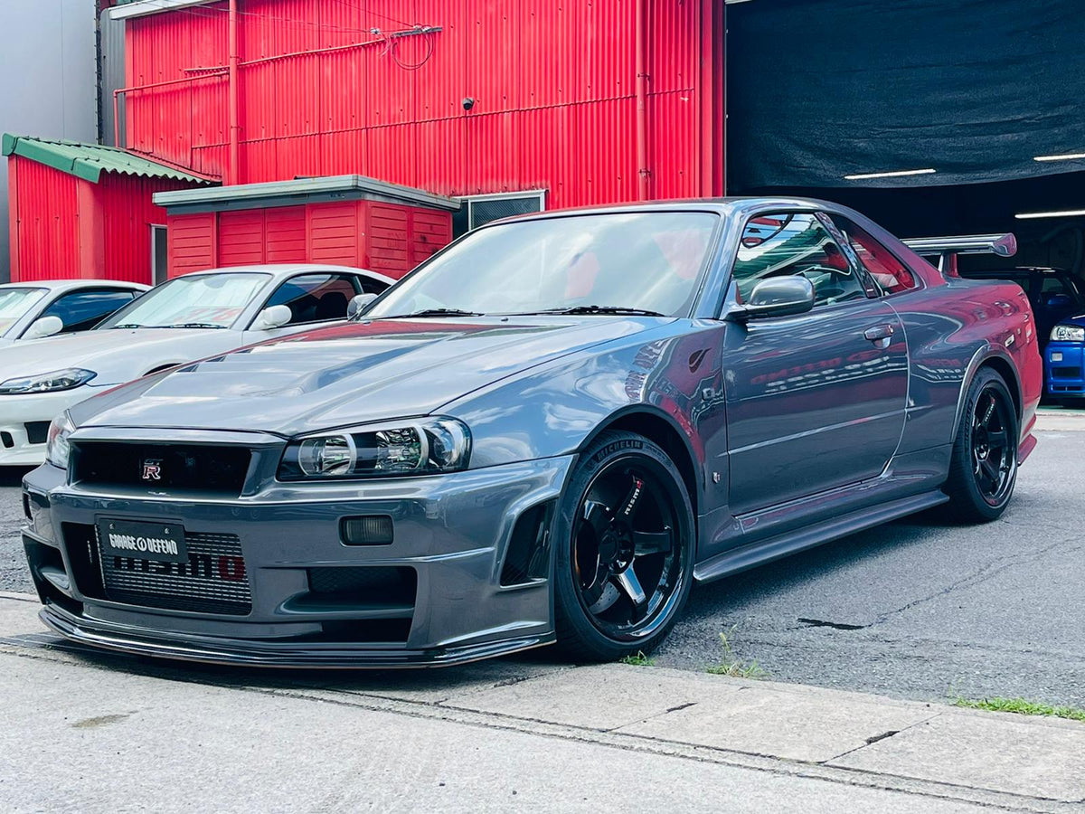 Z-Tune Style Glass Fiber Front Fender - Nissan Skyline R34 GTR (1999 - 2002)