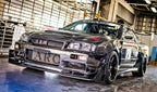 AS Style Carbon Fiber Front Lip – Nissan Skyline R34 GTR (1999–2002)