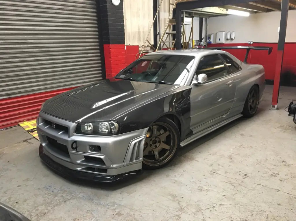 Z-Tune Style Carbon Fiber Front Fender - Nissan Skyline R34 GTR (1999 - 2002)