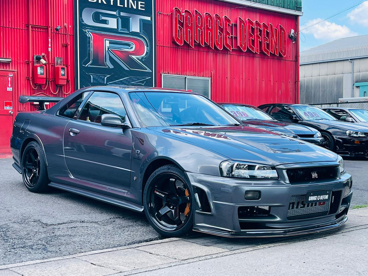 Nismo-1 Style Fiber Glass Hood Bonnet – Nissan Skyline R34 GTR (1999–2002)