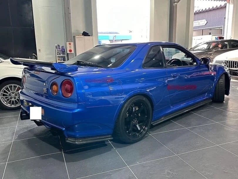 Nismo Style Forged Carbon Rear Spats - Nissan Skyline R34 GTR (1999 - 2002)