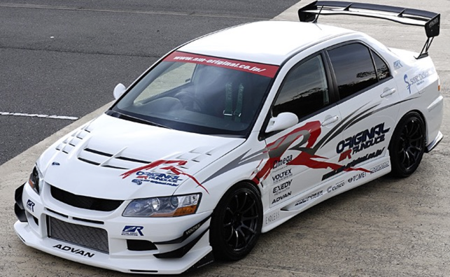 Voltex Style Carbon Fiber Front Bumper with Canards & Front Lip - Mitsubishi Evolution 7 8 9