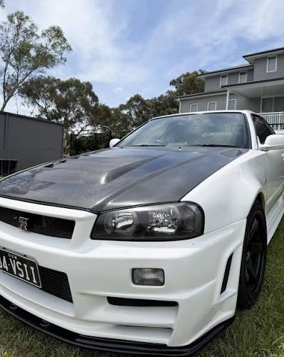 JSK Style Carbon Fiber Hood Bonnet – Nissan Skyline R34 GTR (1999–2002)